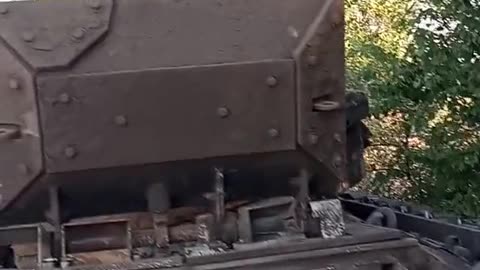 A completely burnt-out M2A2 Bradley ODS-SA infantry fighting vehicle with a BRAT remote sensing