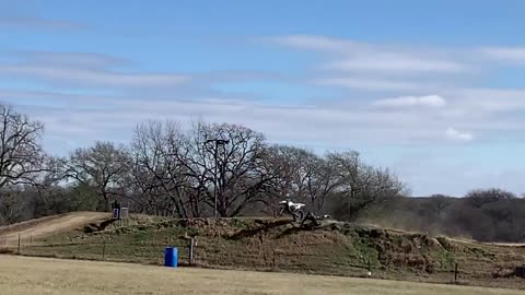 Guy Attempts a Jump in a Motocross Round but Misses His Landing and Falls