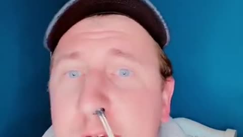 Man Waxes His Nose by Himself