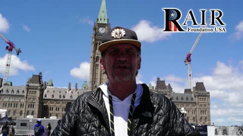 Trucker arrested for no mask speaks at Ottawa demo