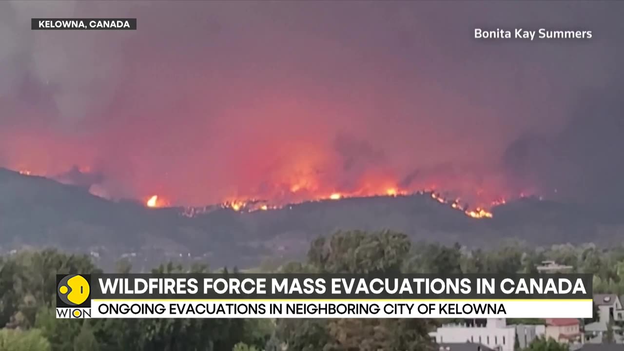 Wildfires force mass evacuations in canada