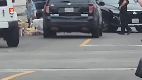 LAPD shooting dog on Paloma and Pico. The dogs owners was getting jumped by the people in the black