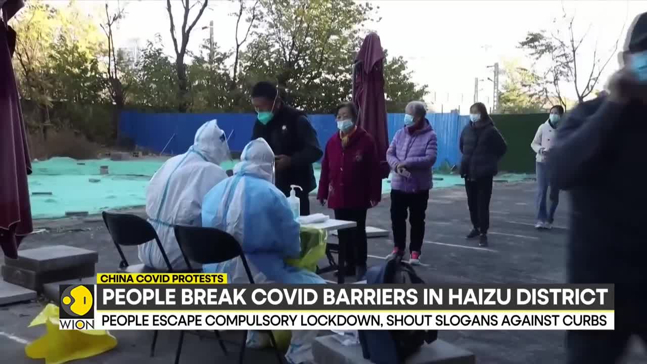 China COVID protests_ People break COVID barriers in Haizhu district _ World English News _ WION (1)