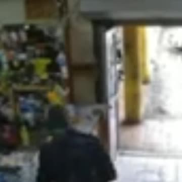 man was caught on camera robbing person in supermarket