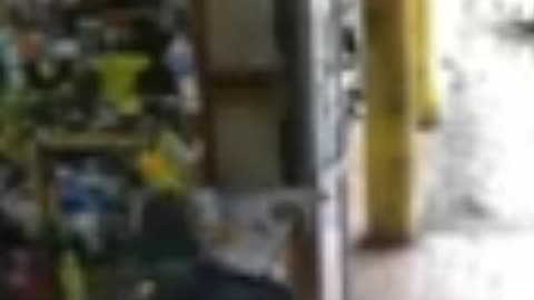 man was caught on camera robbing person in supermarket