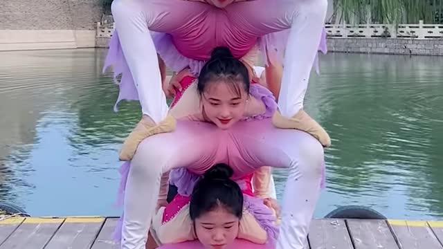 Acrobats making the human pyramid