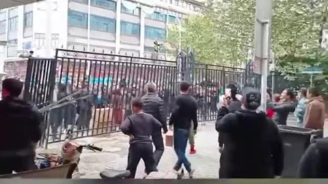 China: Citizens chant, "It started in Wuhan, and it ends in Wuhan,"