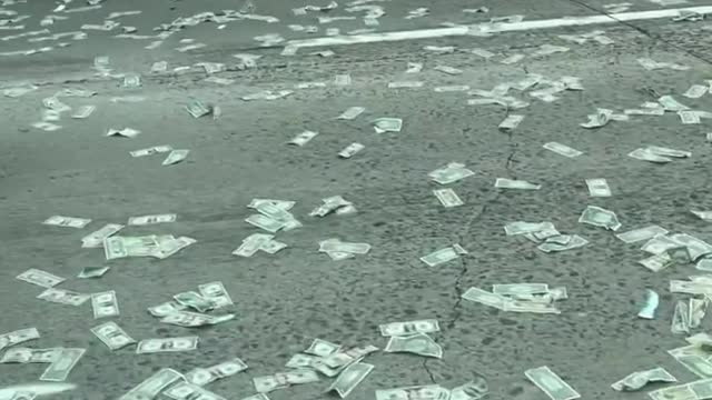 Armored truck scatters cash on California freeway! People scoop it up!