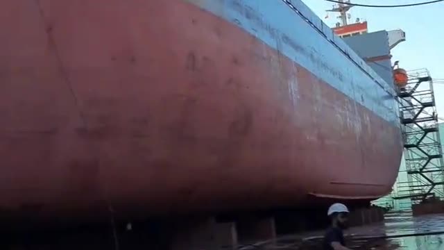 a giant boat building a yard