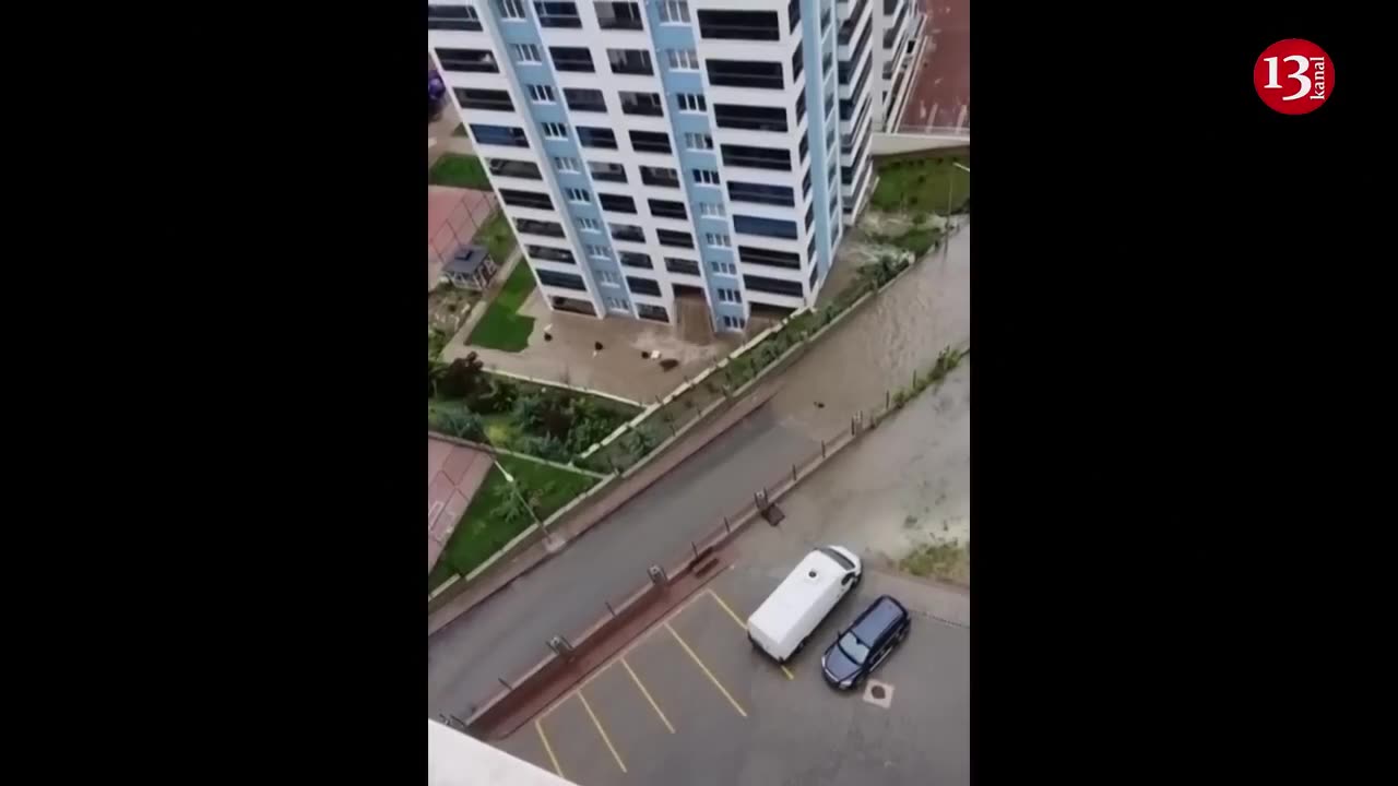 Flood waters enter apartment building, pour down from second-floor balcony in Ankara