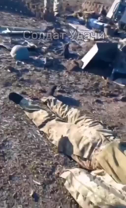 Two Russian Soldiers Film the Beheaded Bodies of Ukrainian Soldiers
