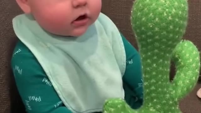 Baby playing with funny toy