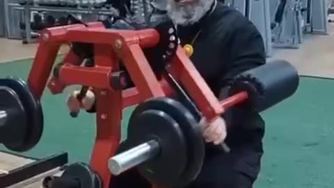 Russian Orthodox Priest is playing in the Gym