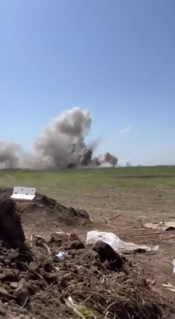 Ukrainian soldiers on the second line of defense filming Russian artillery hitting the first line.