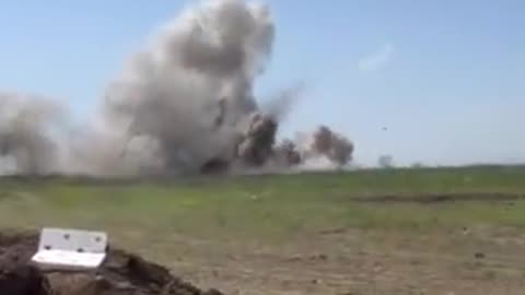 Ukrainian soldiers on the second line of defense filming Russian artillery hitting the first line.