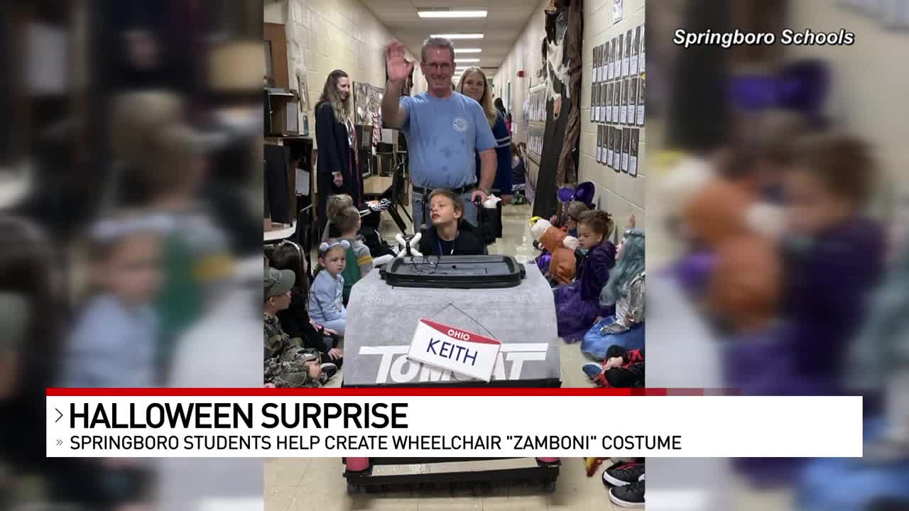 Student dresses up as favorite janitor's floor sweeper for Halloween