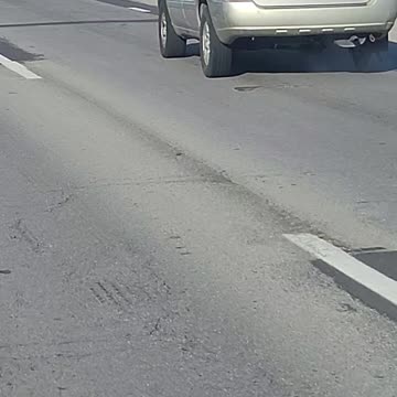 Car goes up in flames seconds after