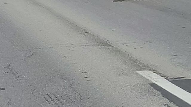 Car goes up in flames seconds after