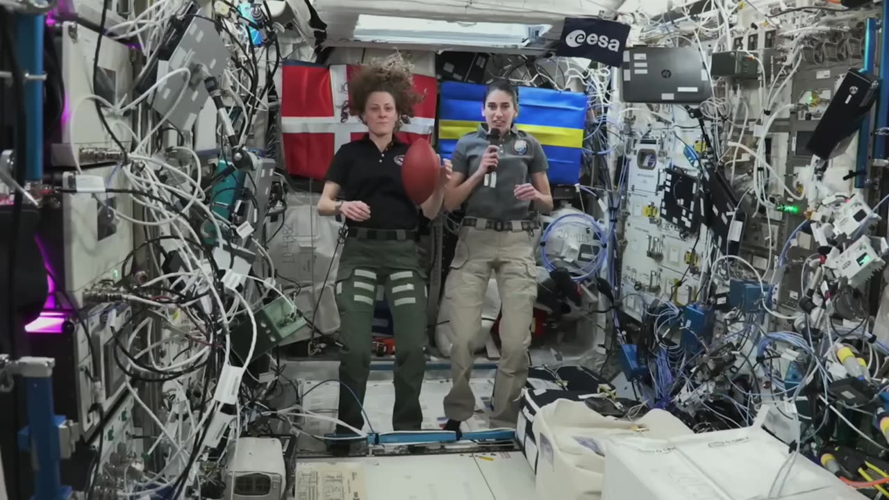 NASA Astronauts Aboard Space Station Huddle Up for Super Bowl