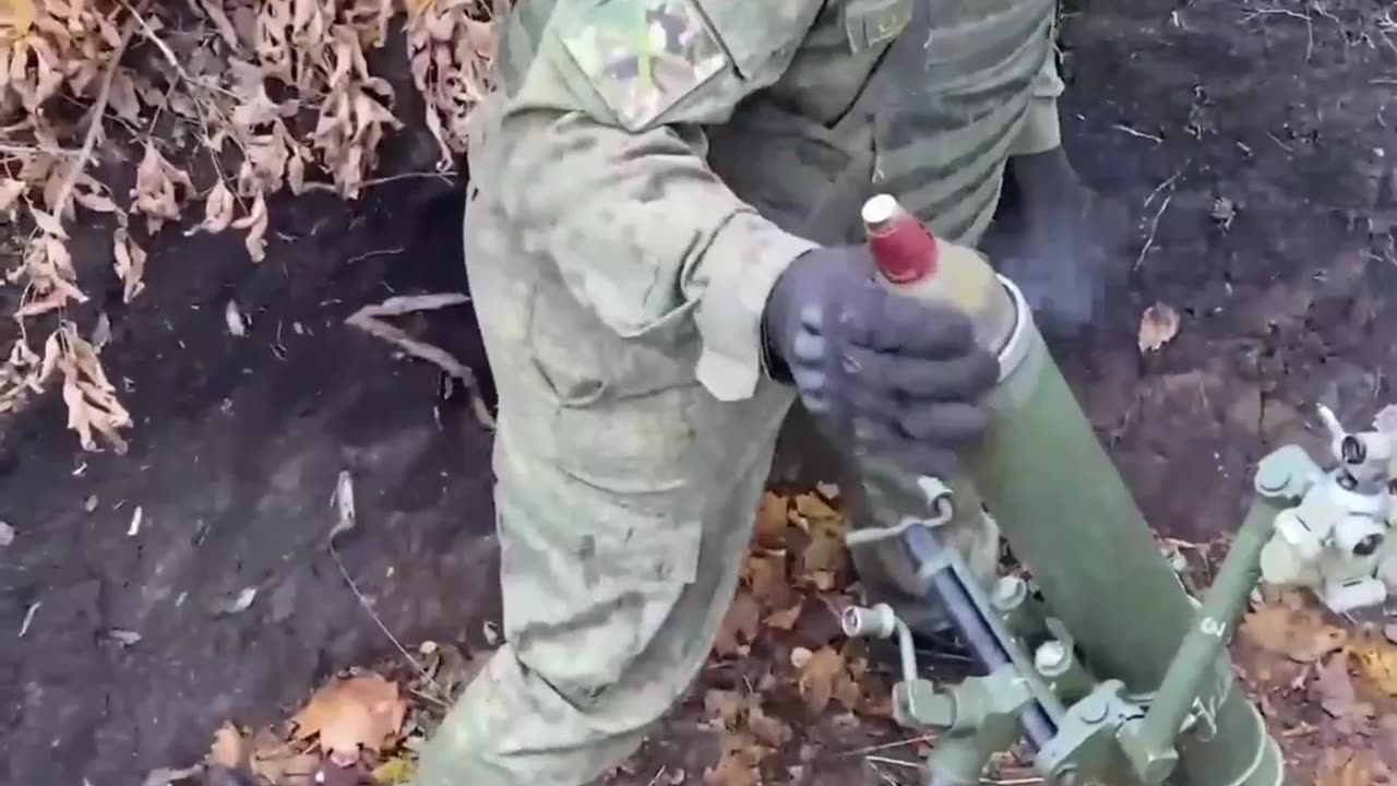 Crew of the 82-mm Tray mortar performing fire missions