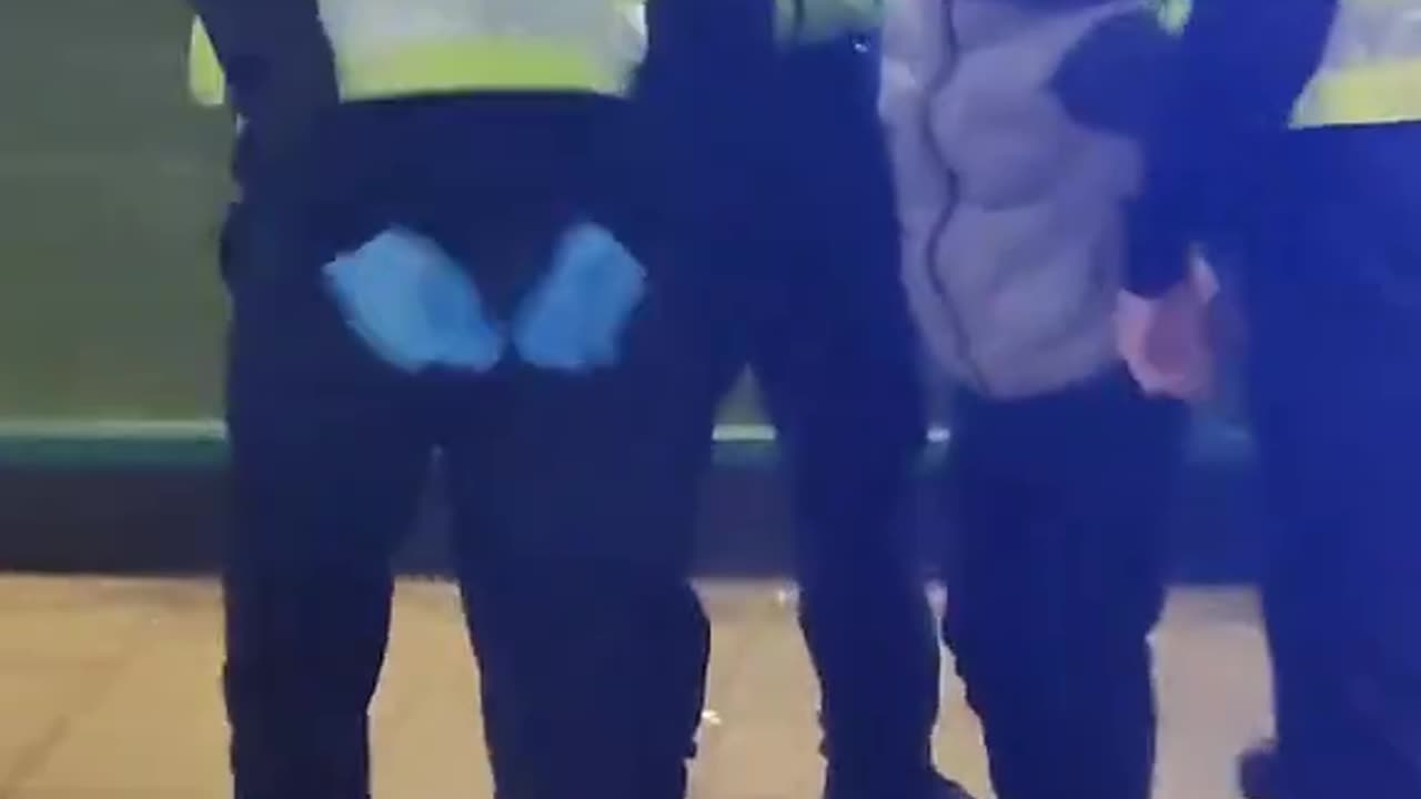 Seven police officers in UK to arrest a child.