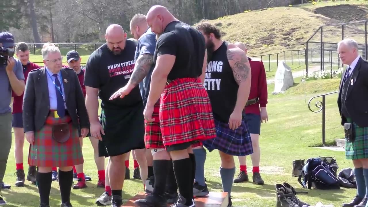 World's Strongest Men in a Tug o' War Challenge at Braemar Gathering Highland Games site in Scotland