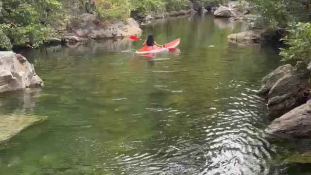 A relaxing canoe tour on a quiet and enchanting river.