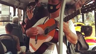 Hotel California song with acoustic guitars on a bus, Montevideo