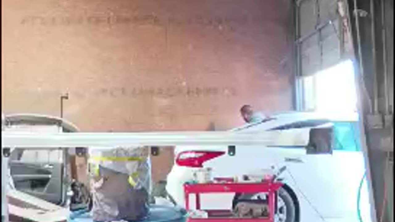 painting a side molding for a white Nissan Altima