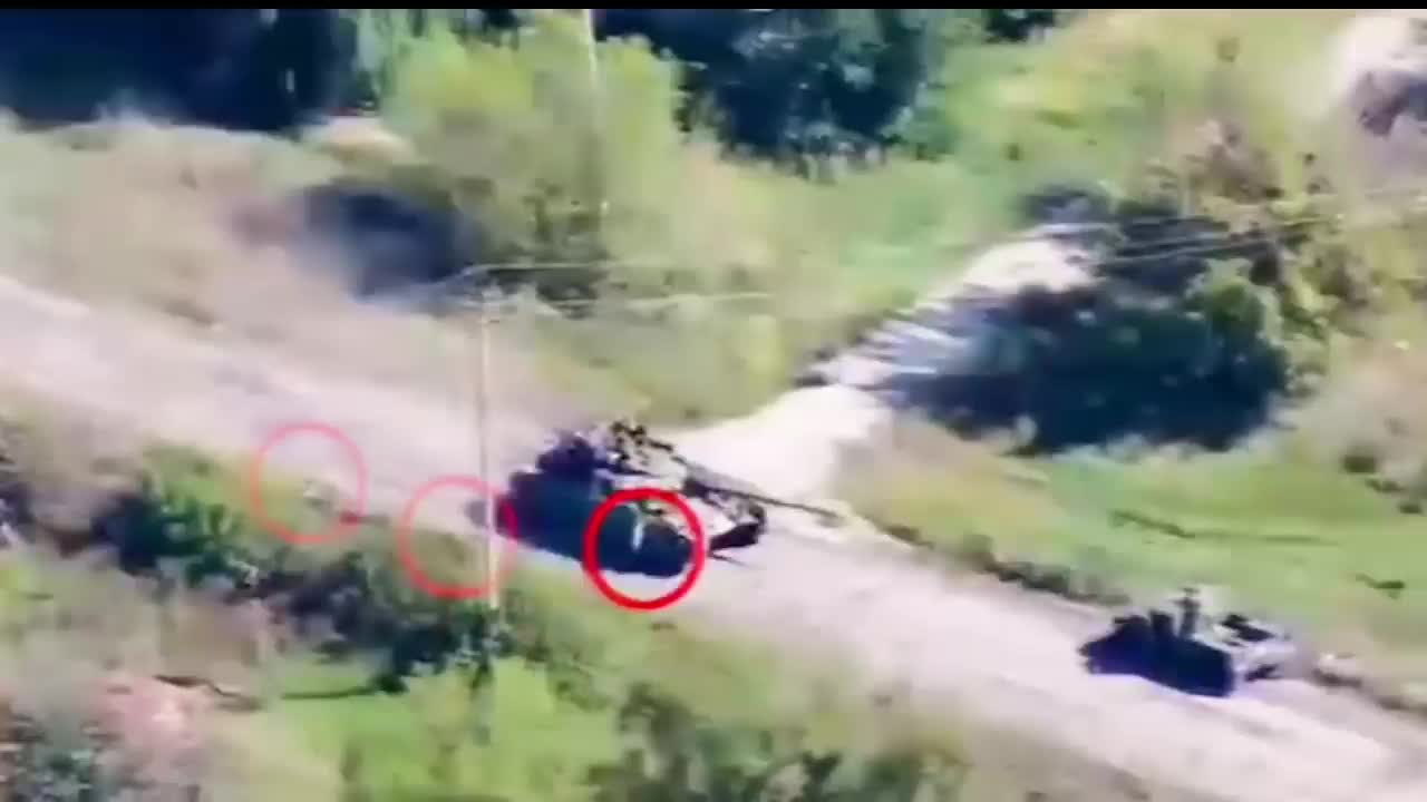 Russian Tank Runs Over Comrades