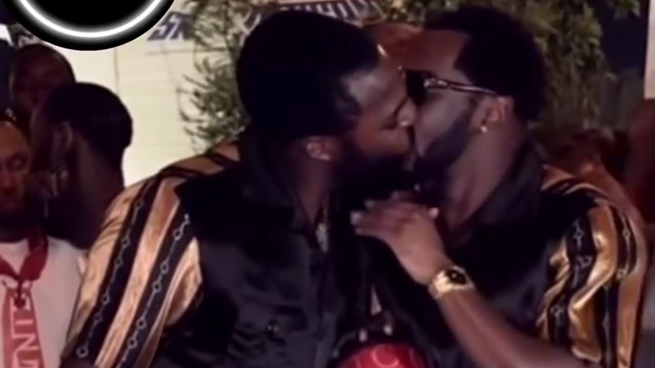 Meek Mills kissing Diddy Dressed up like a couple