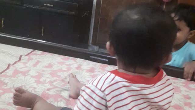 Big Sister playing with Brother