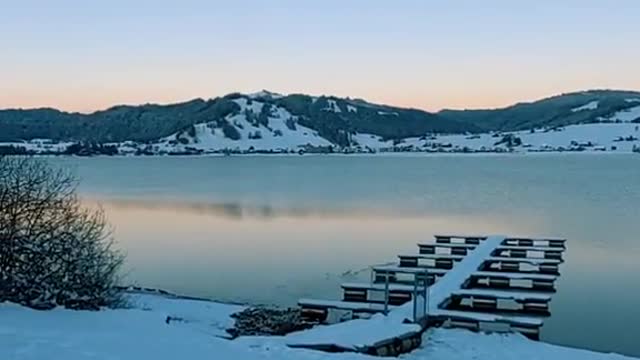 Snow by the lake