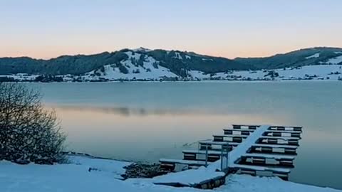 Snow by the lake