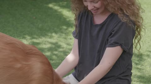 Woman Bonding with Pet Dog