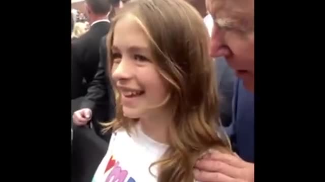 Creepy Joe strikes again! Biden sneaks up behind girl, grabs her shoulders