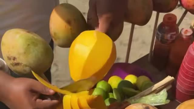 Fresh mangoes on the beach in