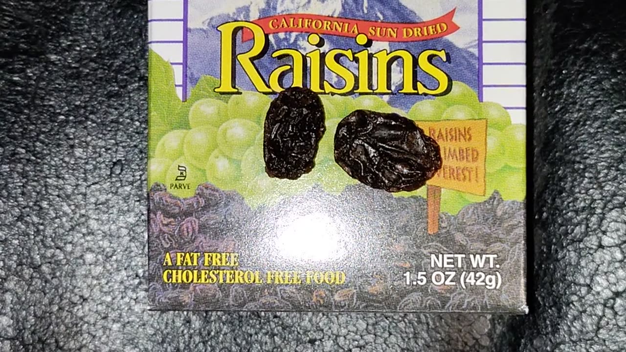 Eating Boghosian California Sun Dried Raisins, Dbn, MI, 6/17/24