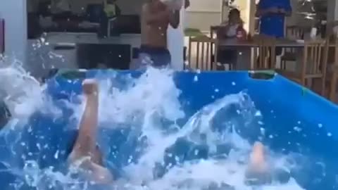 big man doing a kick in pool
