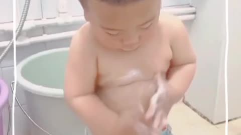 Cute Baby Taking Bath In Summer