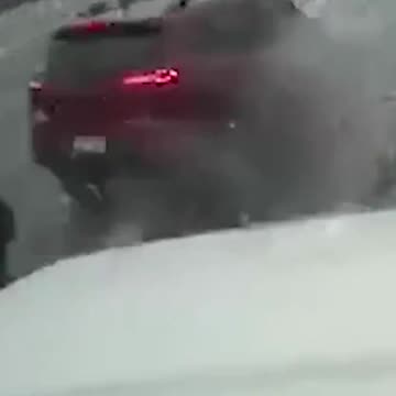 The moment a vehicle clips the corner of a snow plow in Ohio and spins off the road