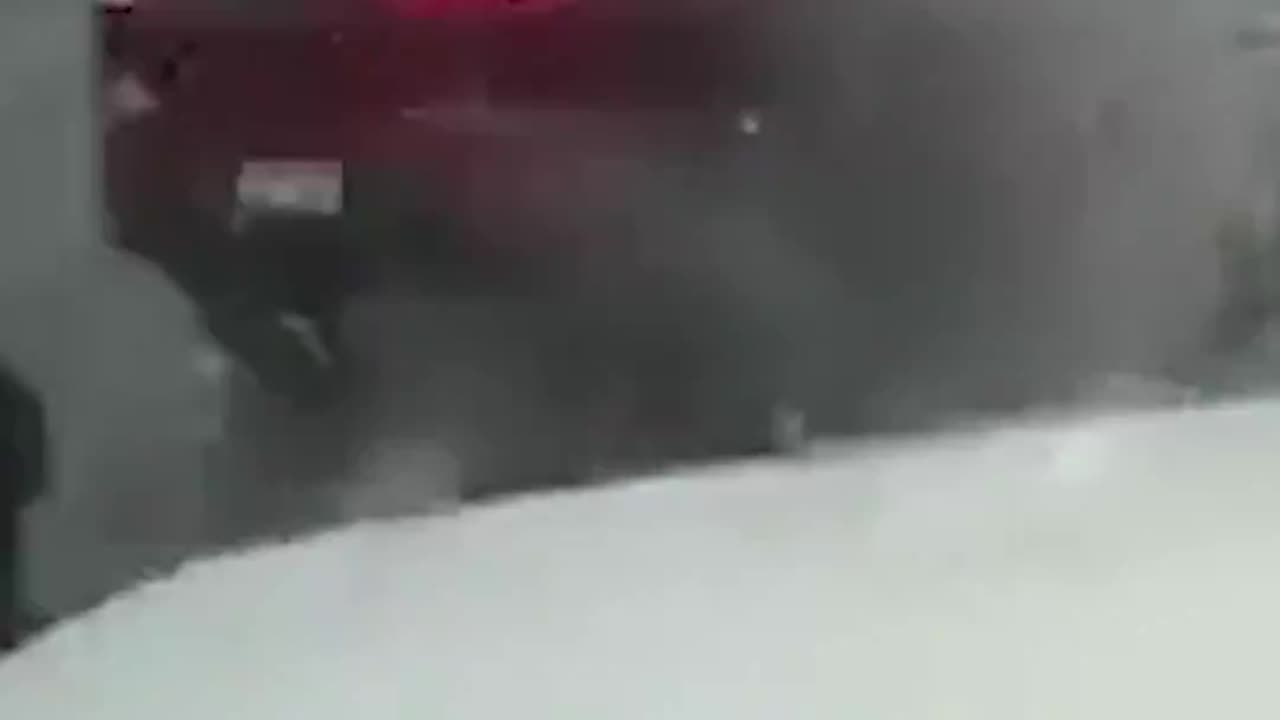 The moment a vehicle clips the corner of a snow plow in Ohio and spins off the road