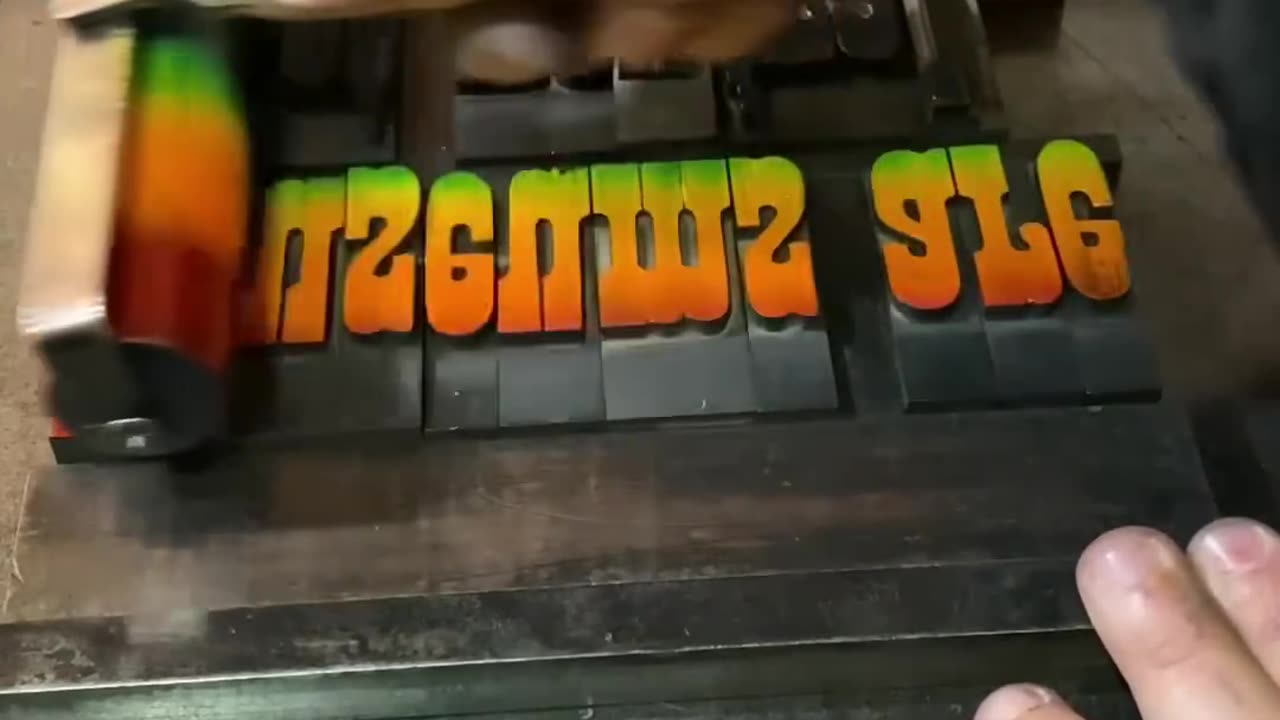letarpress printing a phrase in in multiple inck colour 😀
