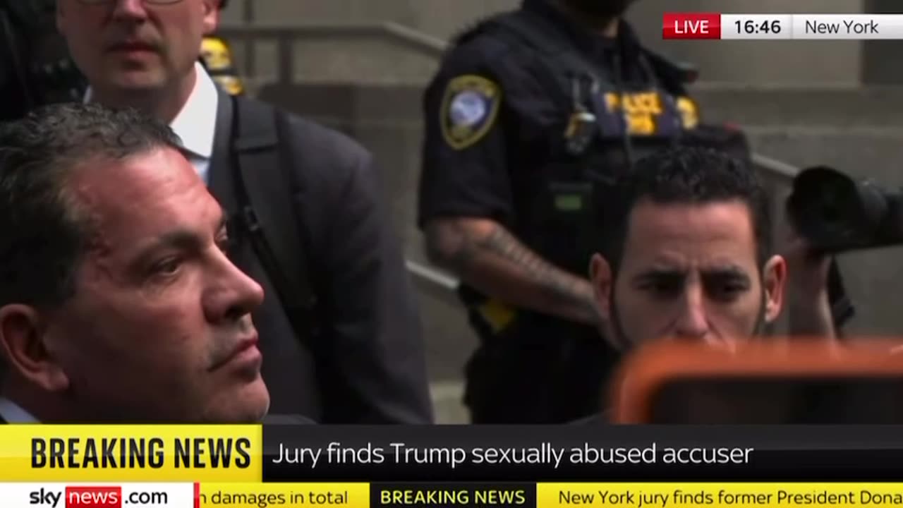 The guys are swearing in background "Political Witch Hunt"