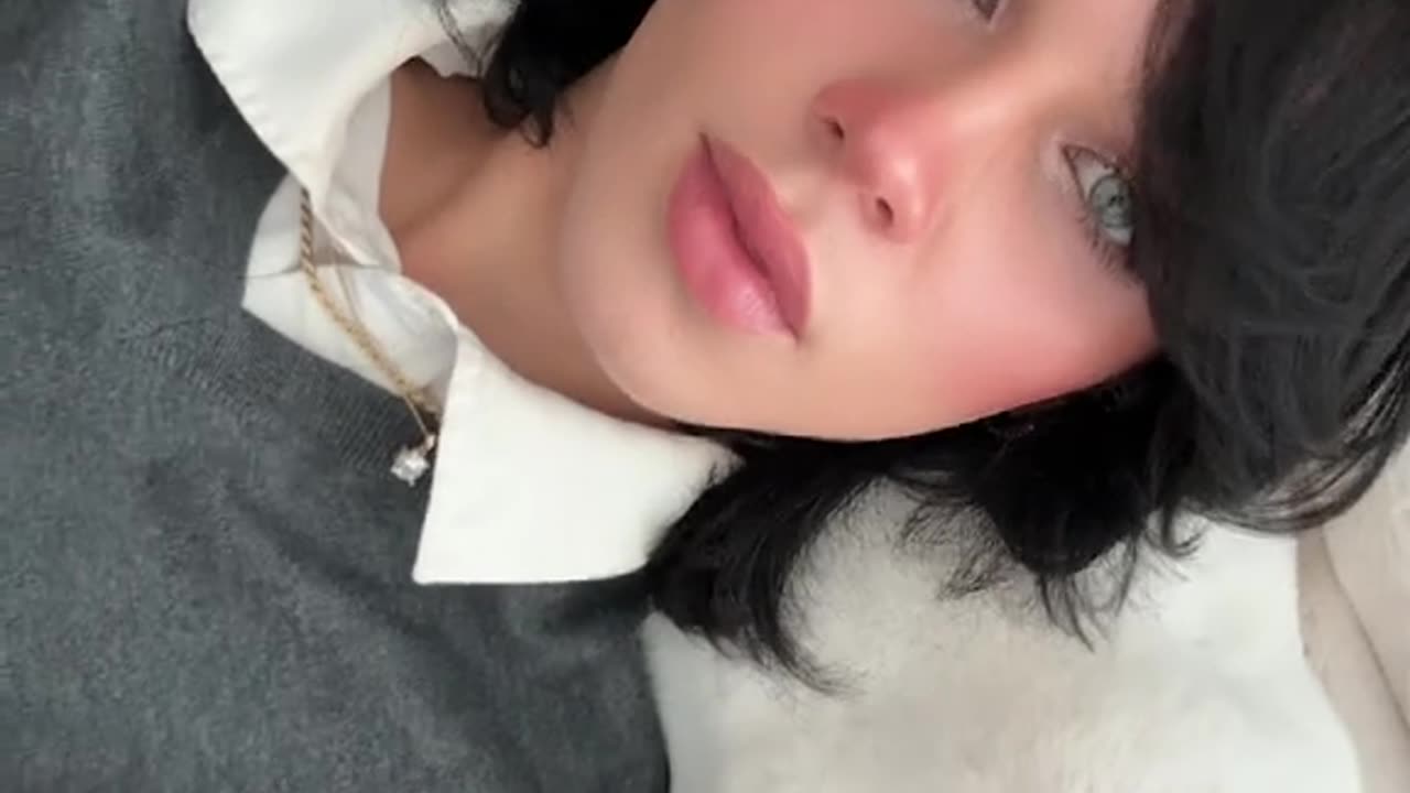 a beauty femboy in home seeing the screen