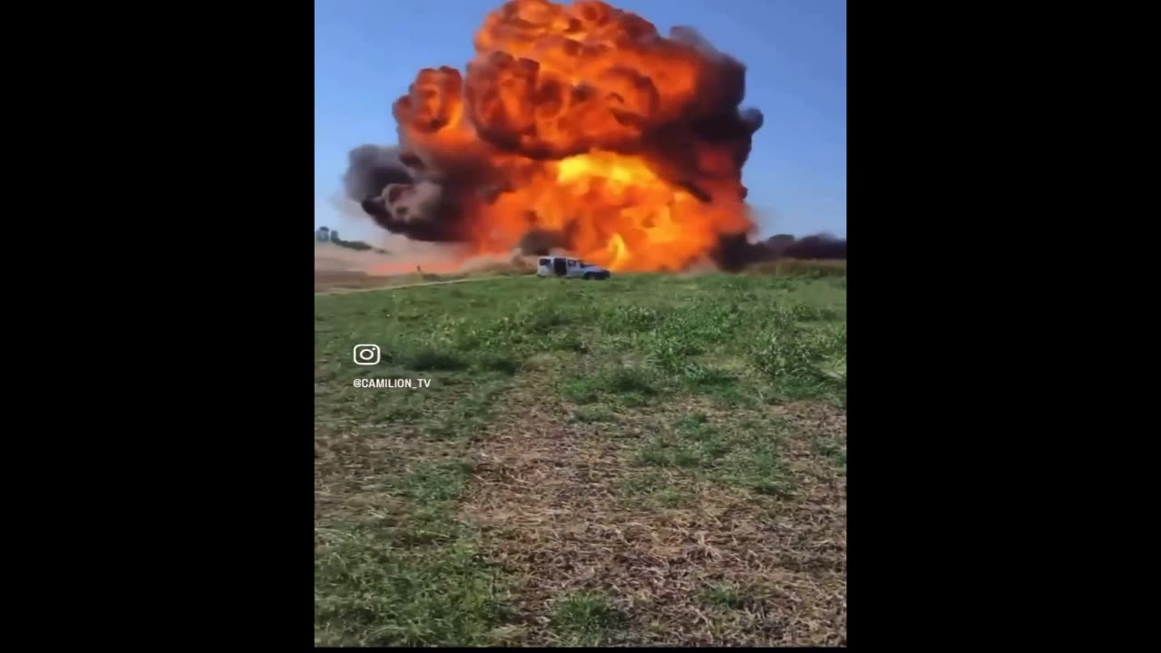 Plane plummets into ground near occupied vehicle