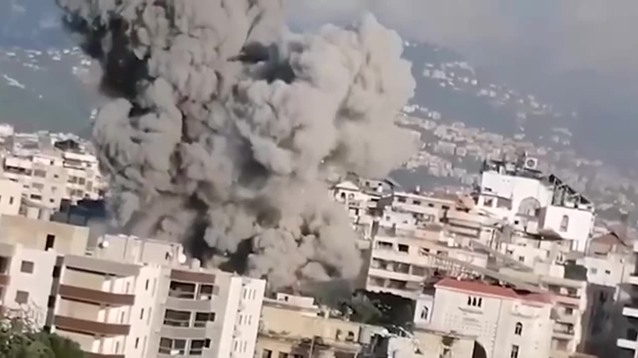 The moment Israeli airstrikes raze residential buildings to the ground