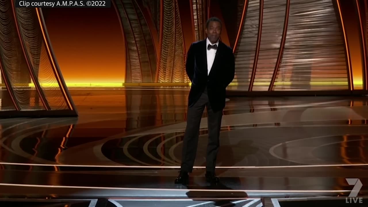 Watch the uncensored moment Will Smith smacks Chris Rock on stage at the Oscars, drops F-bomb