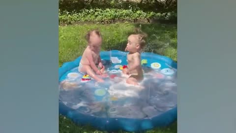 Funny Babies Playing With Water