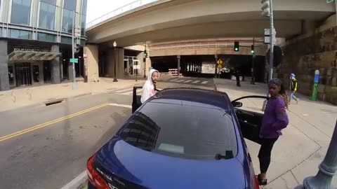 Angry racist couple go off on dude for asking them to exit the bike lane